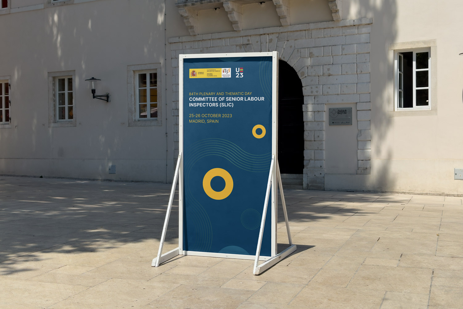 SLIC signage system — standee and wayfinding wall sign